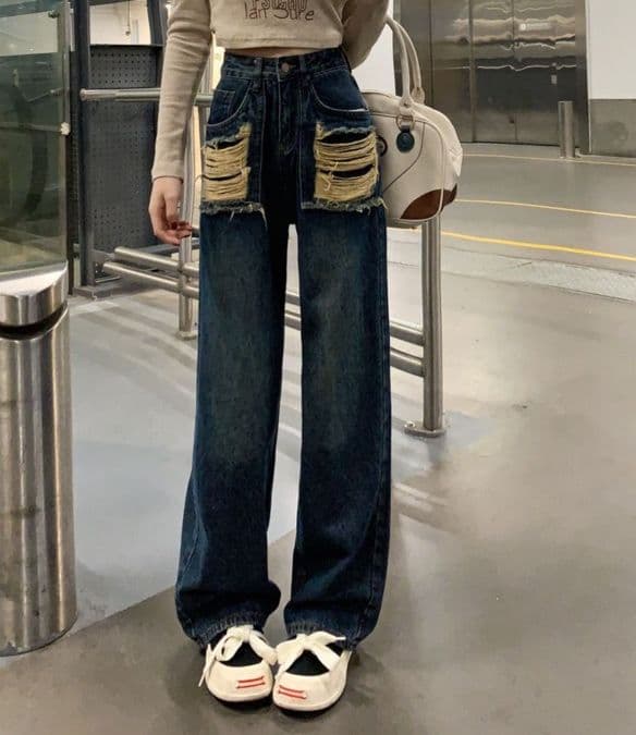 フレアパンツ 大胆なダメージ加工が印象的な裾広がりフレアパンツ